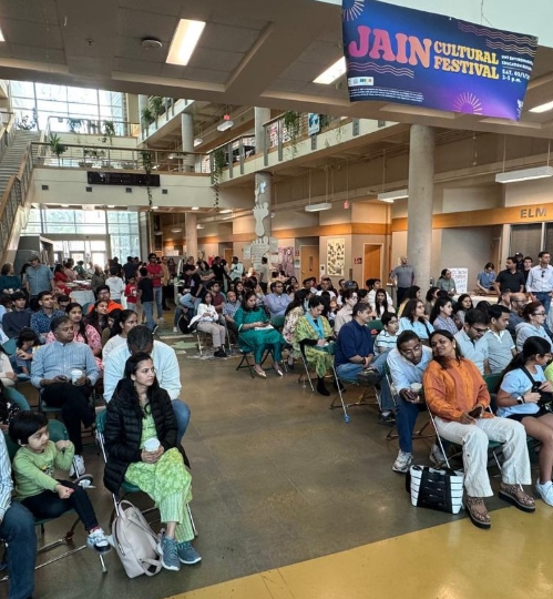 View of people seated in a large atrium